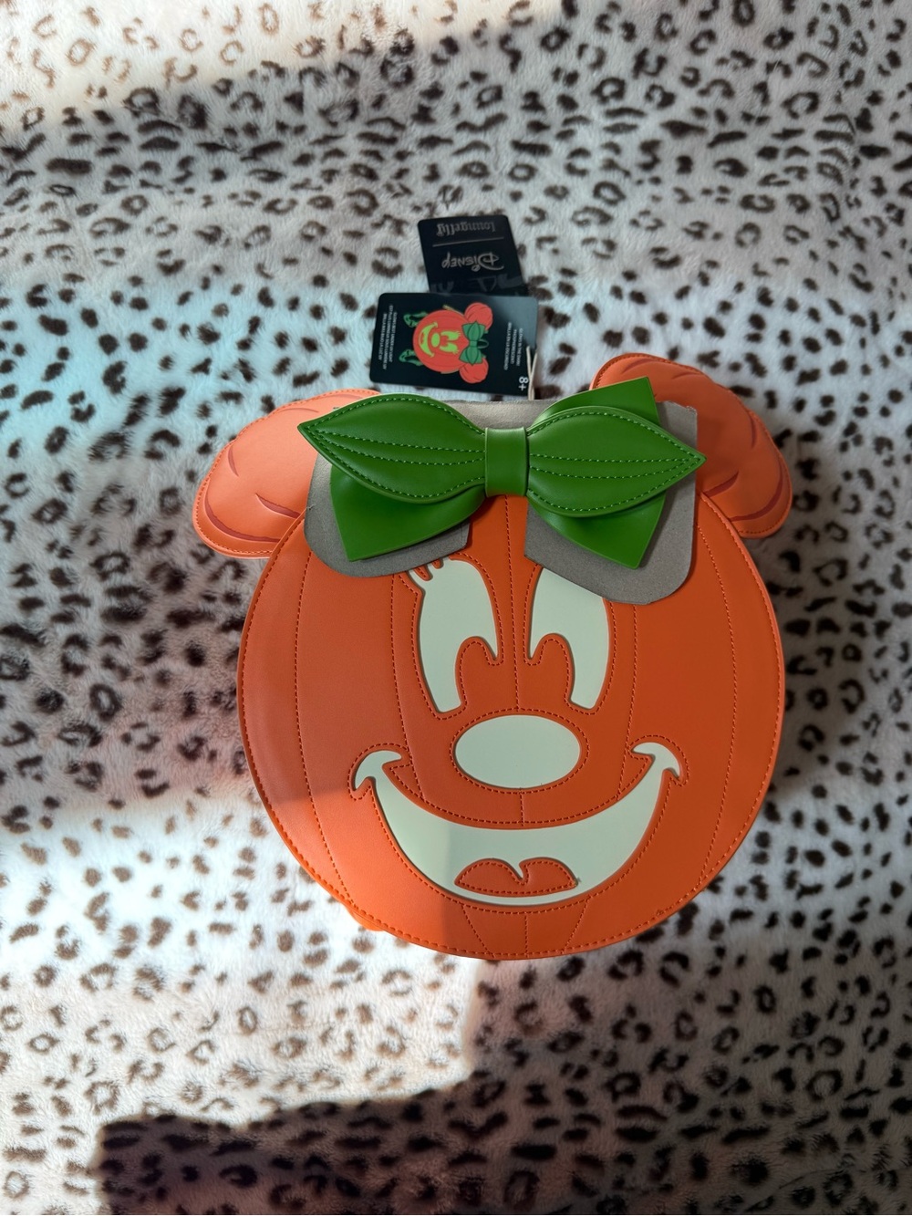 Disney Orange Pumpkin Minnie backpack with Green Bow Accent